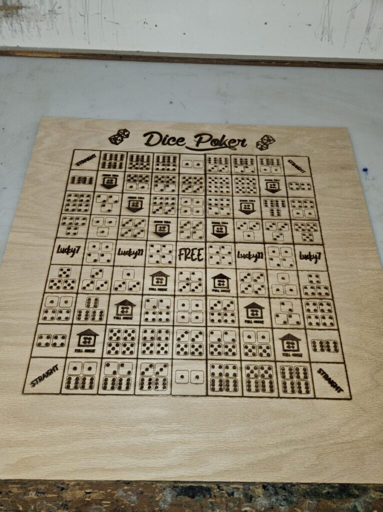 A wooden board with dices on it.